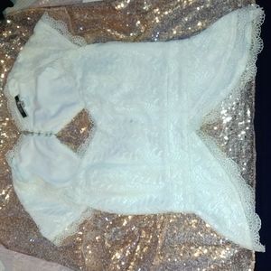NikiBiki small embroidery white crop top new without tags